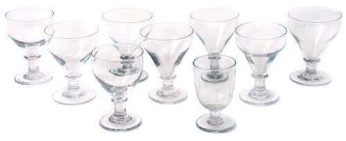 Group of nine late 18th/early 19th century glass rummers, eight with ogee shaped bowls above short