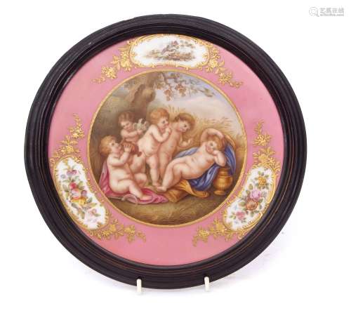 19th century Continental porcelain Sevres style plaque in black wooden frame, the plaque modelled