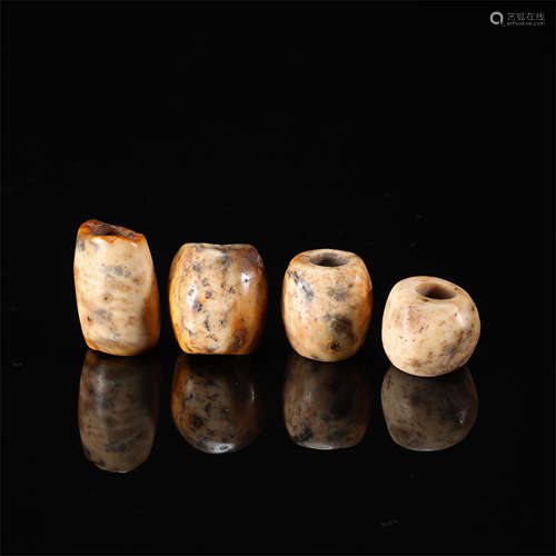 FOUR CHINESE ANCIENT JADE BEADS HONGSHAN PERIOD