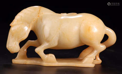 A HETIAN JADE CARVED HORSE SHAPED PENDANT