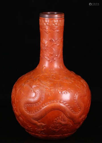 A LACQUER CARVED DRAGON PATTERN FLASK