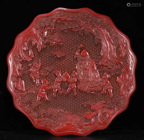 A LACQUER CARVED STORY PATTERN PLATE
