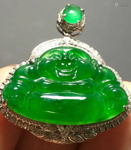 A GREEN JADEITE CARVED BUDDHA PENDANT, TYPE A