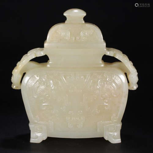 A HETIAN JADE CARVED BEAST PATTERN VASE