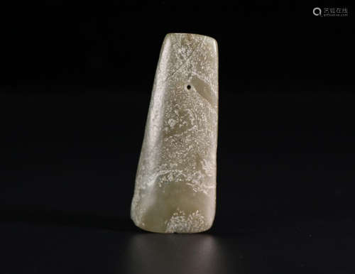 AN OLD JADE CARVED PENDANT