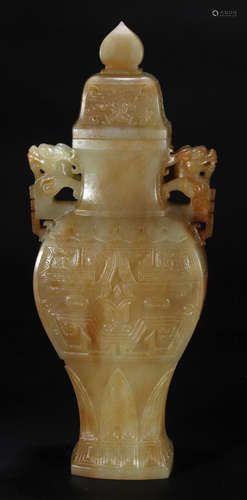 A HETIAN JADE CARVED BEAST PATTERN VASE