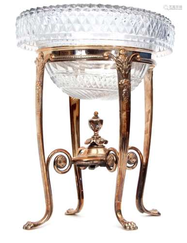 Mid-19th century silver on copper table centrepiece, the oval stand set with four paw legs united by