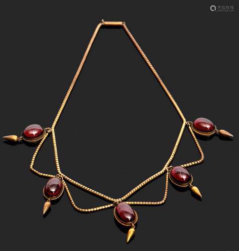 Victorian garnet necklace circa 1860, designed as a fringe of five cabochon garnets, each with