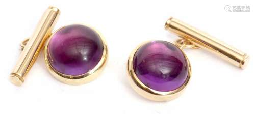 Pair of 750 stamped amethyst cuff links, the circular shaped cabochon amethysts framed with chain