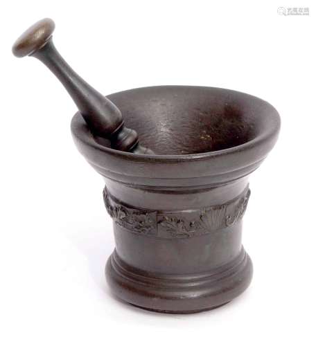 Heavy bronze pestle & mortar of typical form, the body decorated with a line of foliage, 19th