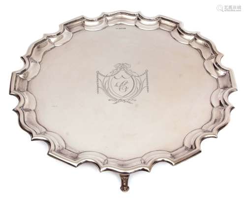 George V salver of shaped circular form with applied rim, polished field with central initialled