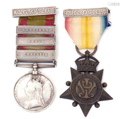 Victorian pair comprising Afghanistan medal 1881 with three clasps, Charasia, Kabul, Kandahar,