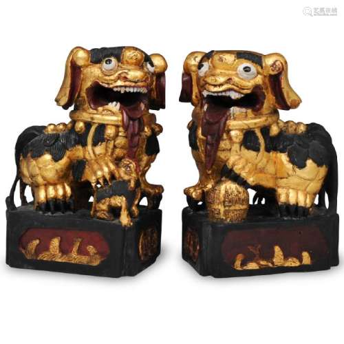 Pair of Chinese Gilt Painted Foo Dogs