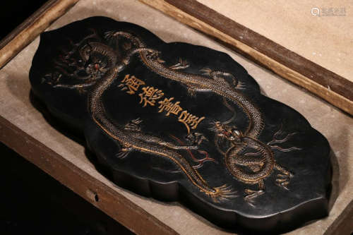 AN INK SLAB CARVED IN DRAGON