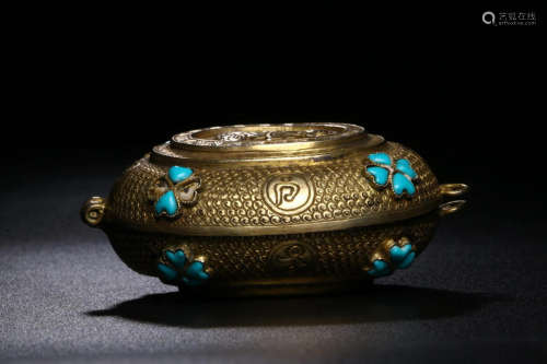 A COPPER GILTED BOX INLAID WITH TURQUOISE STONE