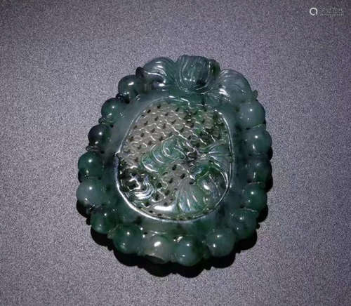 A JADEITE ANIMAL CARVED PENDANT