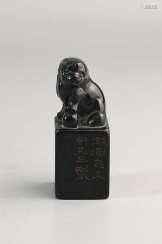 A COAL SPAR SEAL LION ON TOP