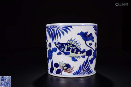 A BLUE & WHITE PEN HOLDER CARVED IN FISHES & FLOWERS