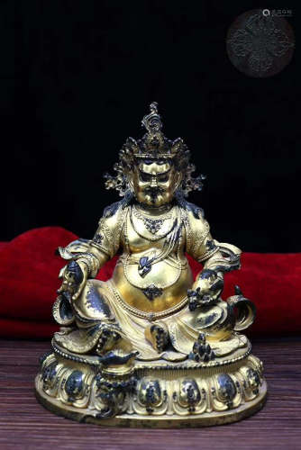 A COPPER GILTED YELLOW TSANBALA BUDDHA