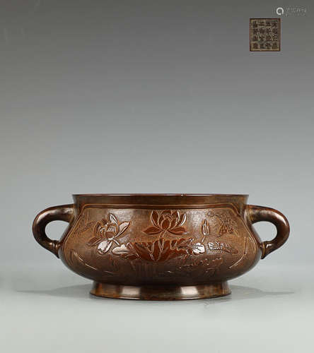 A BRONZE CENSER WITH DRAGON PATTERN