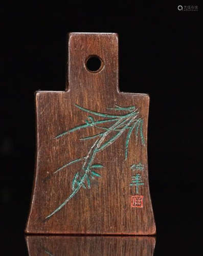 A CHENGXIANG WOOD KNIFE COIN SHAPED PENDANT