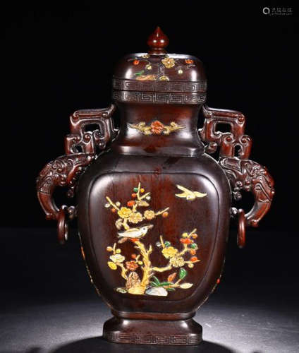 A ZITAN WOOD EAR VASE EMBEDED FLOWERS AND PLANTS