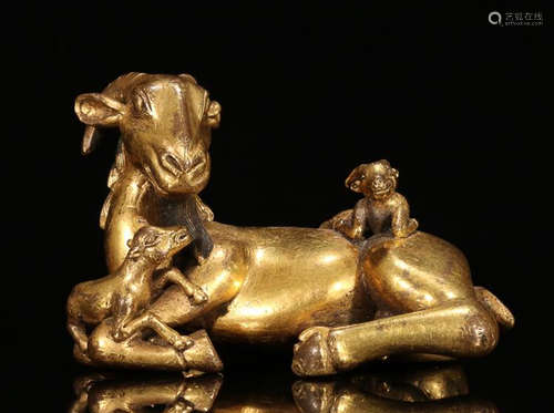 A GILT BRONZE SHEEP SHAPED PAPER WEIGHT