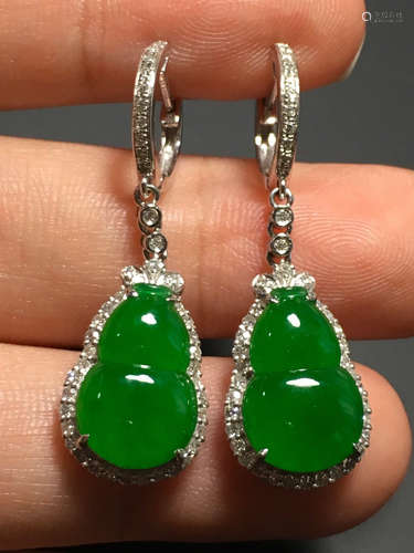 A GREEN JADEITE CARVED GOURD EARDROPS