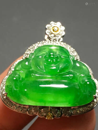 A GREEN JADEITE CARVED BUDDHA FIGURE PENDANT