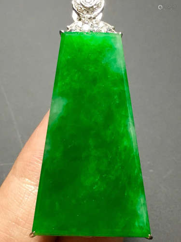 A GREEN JADEITE CARVED “PINGAN