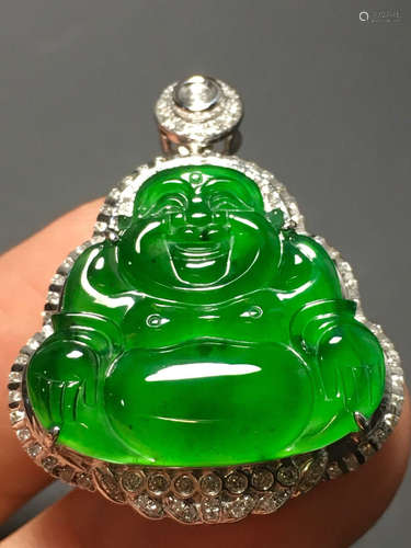 A GREEN JADEITE CARVED BUDDHA FIGURE PENDANT