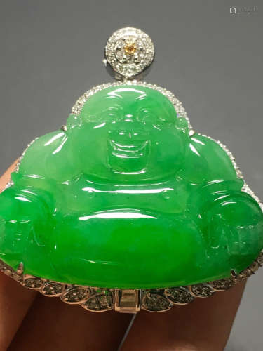 A GREEN JADEITE CARVED BUDDHA FIGURE PENDANT