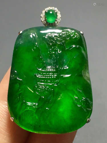 A GREEN JADEITE CARVED LANDSCAPE PENDANT