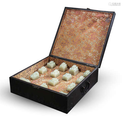 FORTEEN CHINESE WHITE JADE DRAGON SEALS IN ZITAN CASE