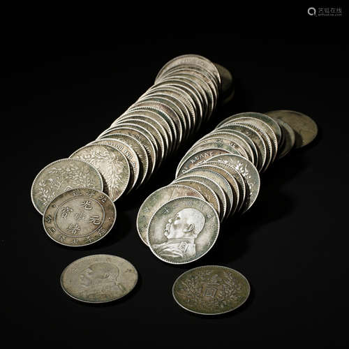 A GROUP OF CHINESE SILVER DOLLAR COINS