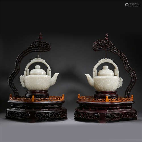 PAIR OF CHINESE CELADON JADE LONG HANDLE TEA POTS ON ROSEWOOD STAND