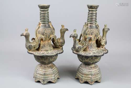 A Pair of Unusual Chinese Vases, the vases raised on a lotus form base with two peacocks on a central platform, with character marks, approx 28 cms h