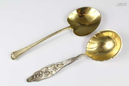 A Sterling Silver Gilt Gorham Ice Cream Server in the form of a palmetto branch, the handle cast with Palm Beach on reverse together with another depicting Whiting Lily of the Valley pattern vegetable server, approx 200 gms