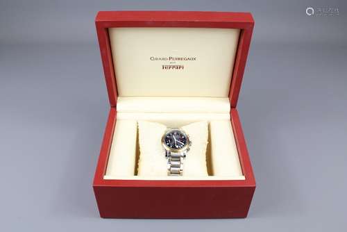 Girard-Perregaux F300 Chrono Ferrari Gentleman's Watch; the watch having a black face with numeric dial, date, second aperture, gold and steel bracelet, in the original box