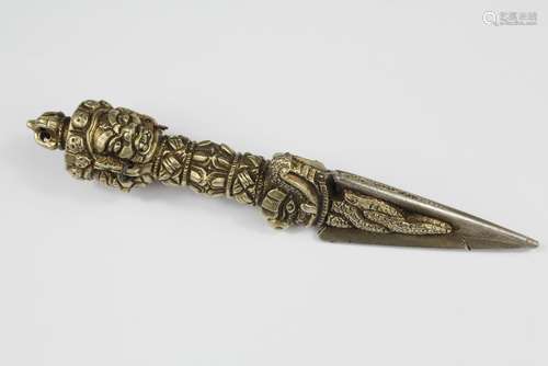 A Tibetan Silver Metal Pointer, the pointer carved with masks, approx 14