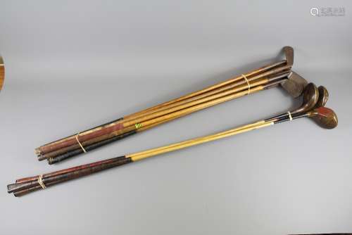 Early 20th Century Hickory-shafted Golf Clubs, including irons, putters and woods