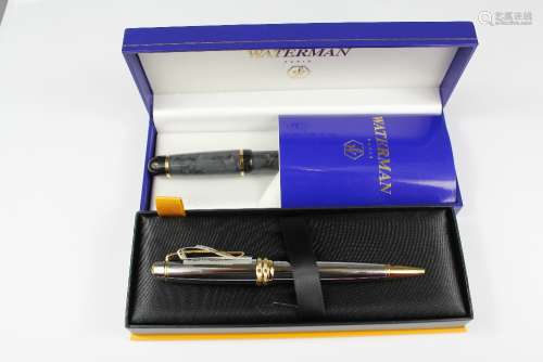 A Boxed Waterman Ball Point Pen, in the original box with paperwork together with a Cross Roller Ball Point Pen, in the original box