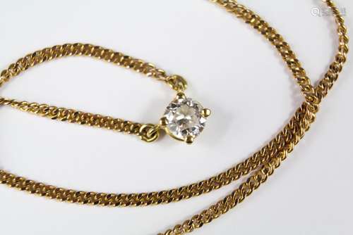 A Lady's Solitaire Diamond Pendant Necklace; retailed by Alan & Romisons in Leeds, on a 9ct gold chain