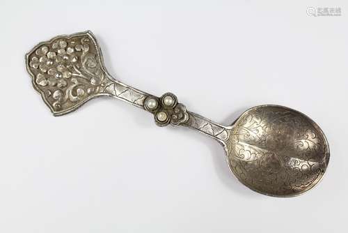 An Antique Tibetan Silver Medicine Spoon, the floral finial set with three pearls, approx 13 cms