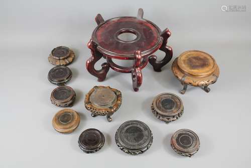 A Collection of Chinese Hardwood and Rosewood Stands of various sizes