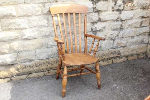 A Pine Fireside Arm Chair, approx 110 cms h