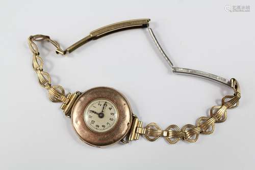 A Rolex 9ct Gold Lady's Bracelet Watch; having manual wind, white dial, black Arabic numerals