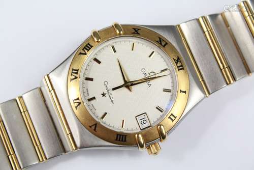 A Gentleman's Omega Constellation Gent's Watch; the gold and steel watch with white enamel face with baton dial, date aperture, sweep second hand