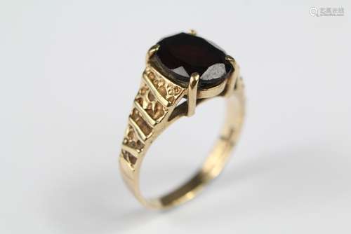 A Vintage 9ct Gold and Garnet Ring; the garnet approx 10 x 8 mm, size M, approx 3