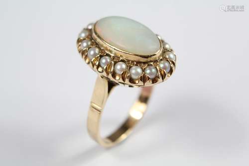 A Lady's 14ct Opal and Diamond Cluster Ring